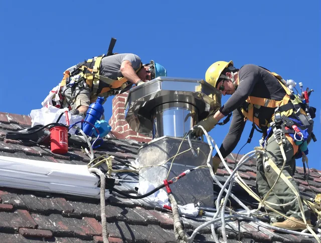 Protective chimney cap installed by Westborough Chimney Sweep in Westborough, MA