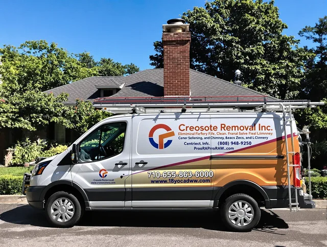 Westborough Chimney Sweep technician removing creosote safely in Westborough, MA